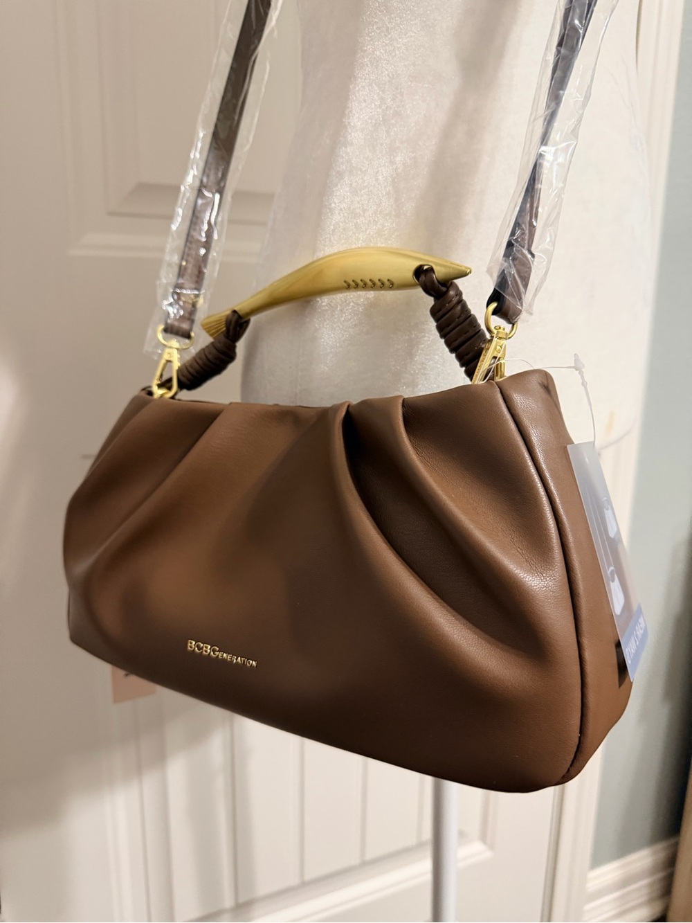BCBGeneration Chocolate Brown Pleated Crossbody Bag with Gold-Tone top Handle.